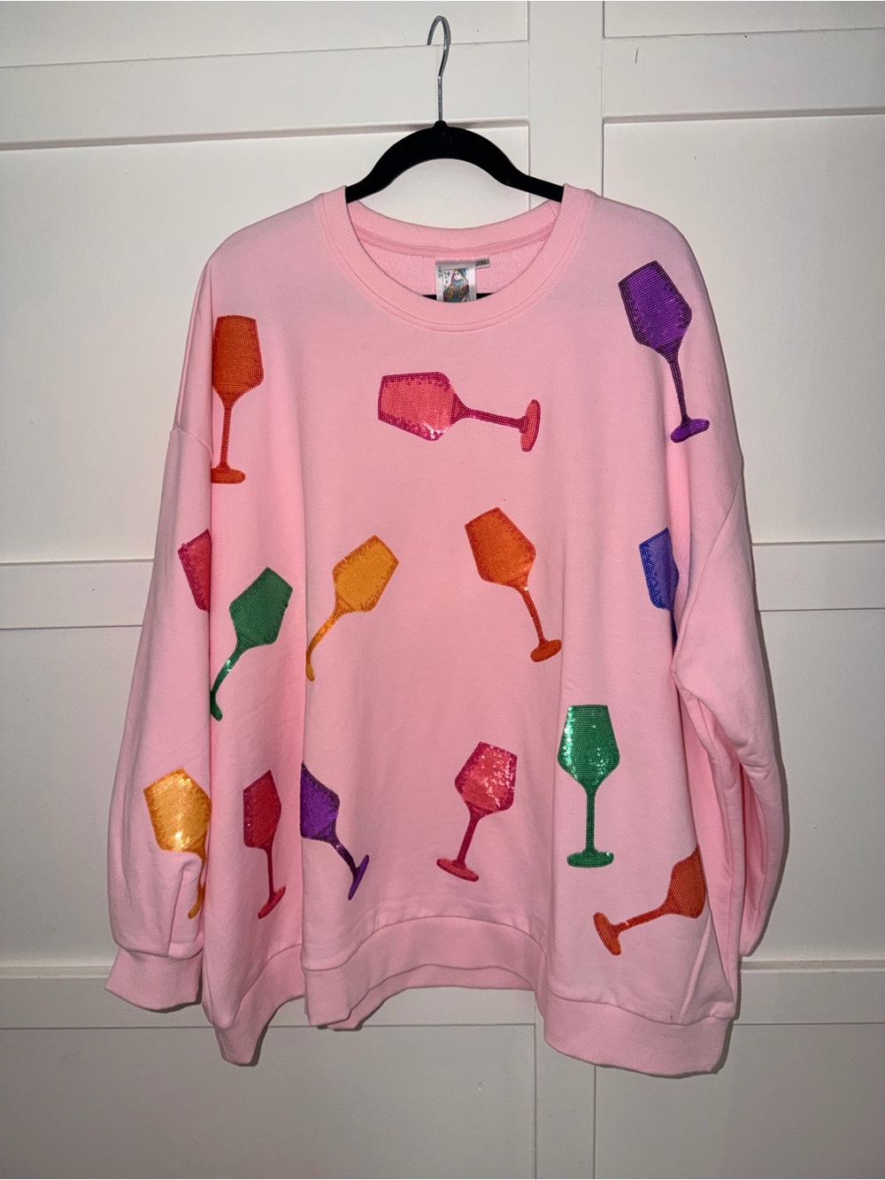 QUEEN OF SPARKLES Pink Sweatshirt with Multicolor Sequin Wine Glasses